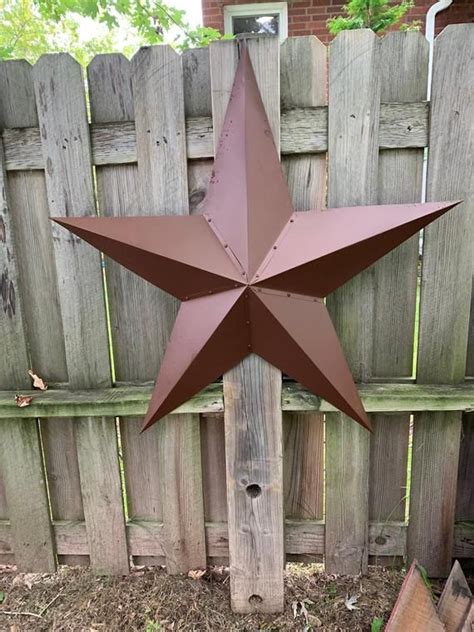 metal star in front of house|barn stars outside of house.